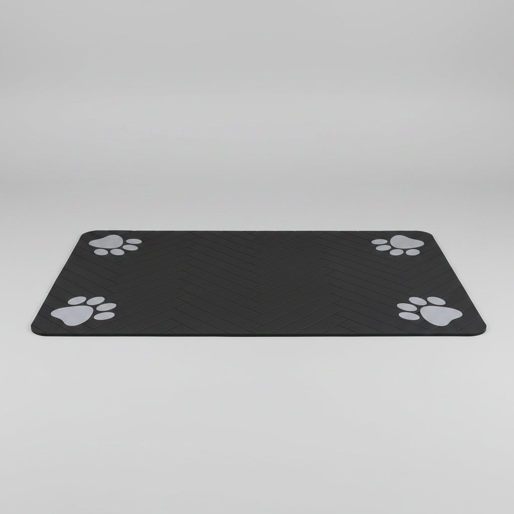 Dog eating from a bowl on a black mat with paw prints, featuring text about cleaning trouble.