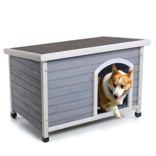 A gray wooden dog house with white trim and a dark textured roof, shown on a white background with a corgi dog peeking out from the arched entrance.