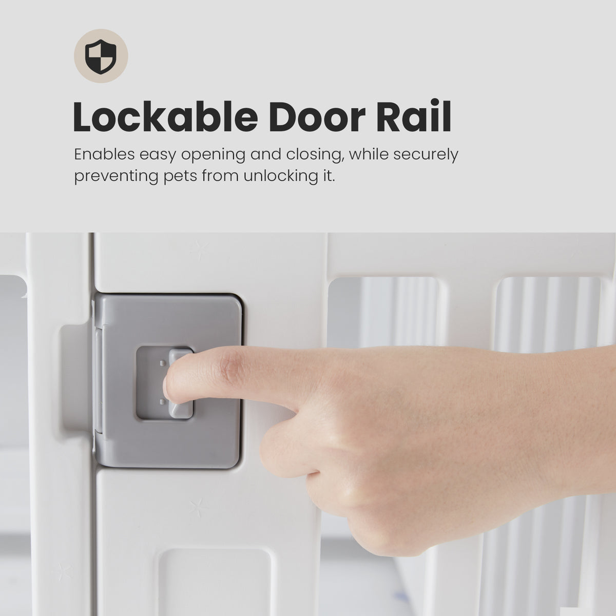 Lockable door rail with a hand demonstrating its use on a white background