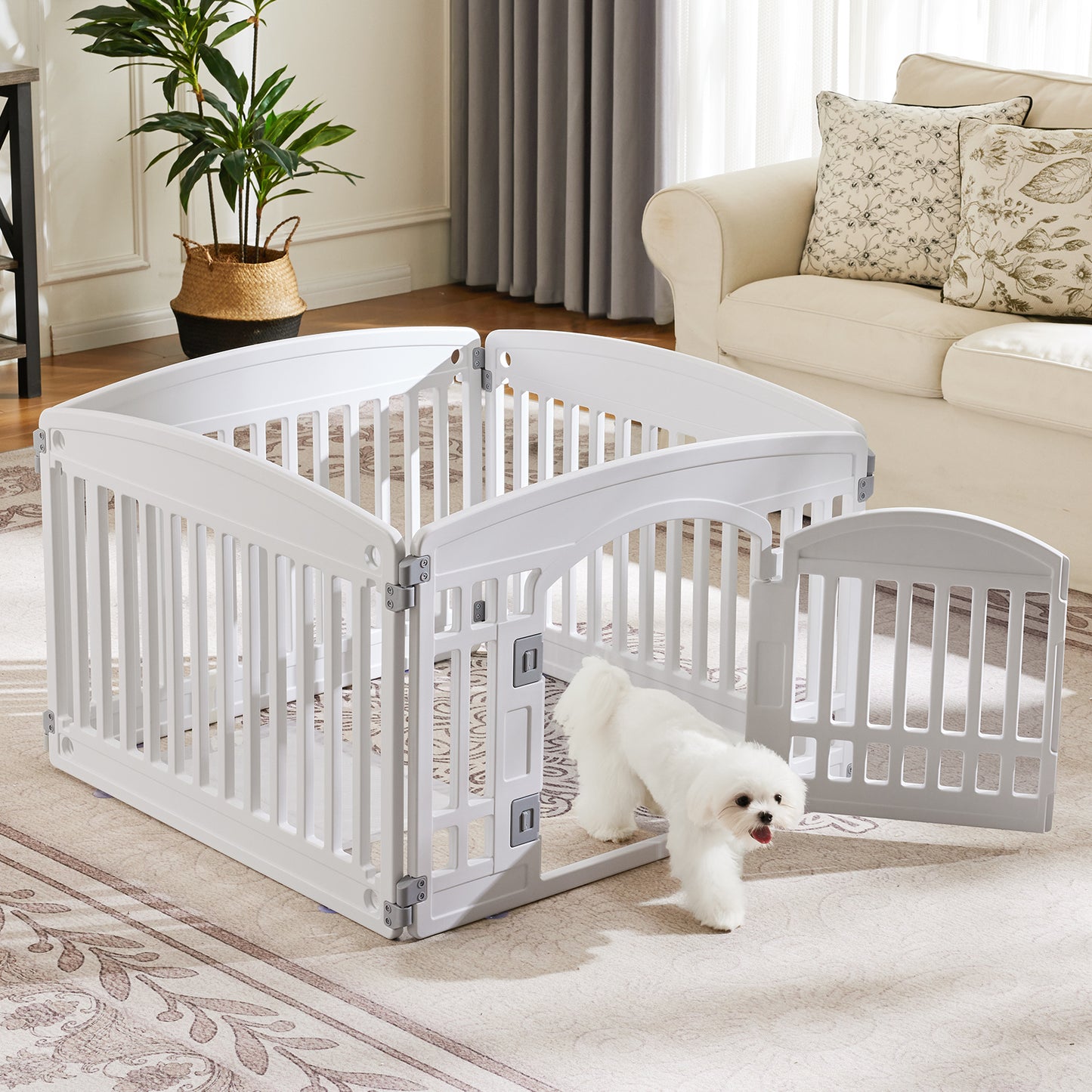 White pet playpen with a small white dog inside in a living room setting.